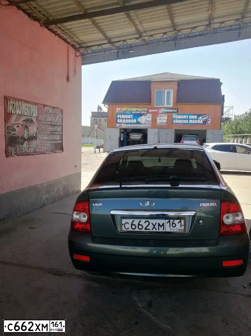 Фото автомобиля LADA 2172 PRIORA, 2011 — госномер М670ВМ01. Цвет: СЕРО-СИНЕ-ЗЕЛЕНЫЙ