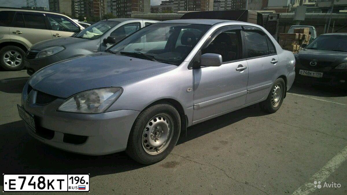 Фото автомобиля MAZDA 3, 2006 — госномер Е748КТ196. Цвет: ЧЕРНЫЙ