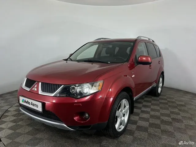 Фото автомобиля MITSUBISHI OUTLANDER, 2008 — госномер В771РК142. Цвет: Красный