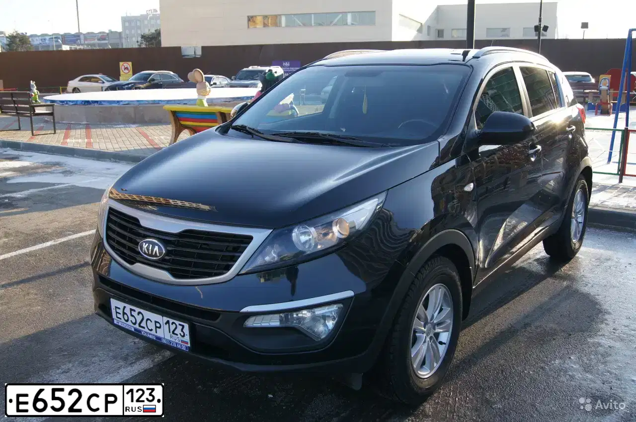 Фото автомобиля KIA SPORTAGE, 2012 — госномер К023АА193. Цвет: ЧЕРНЫЙ