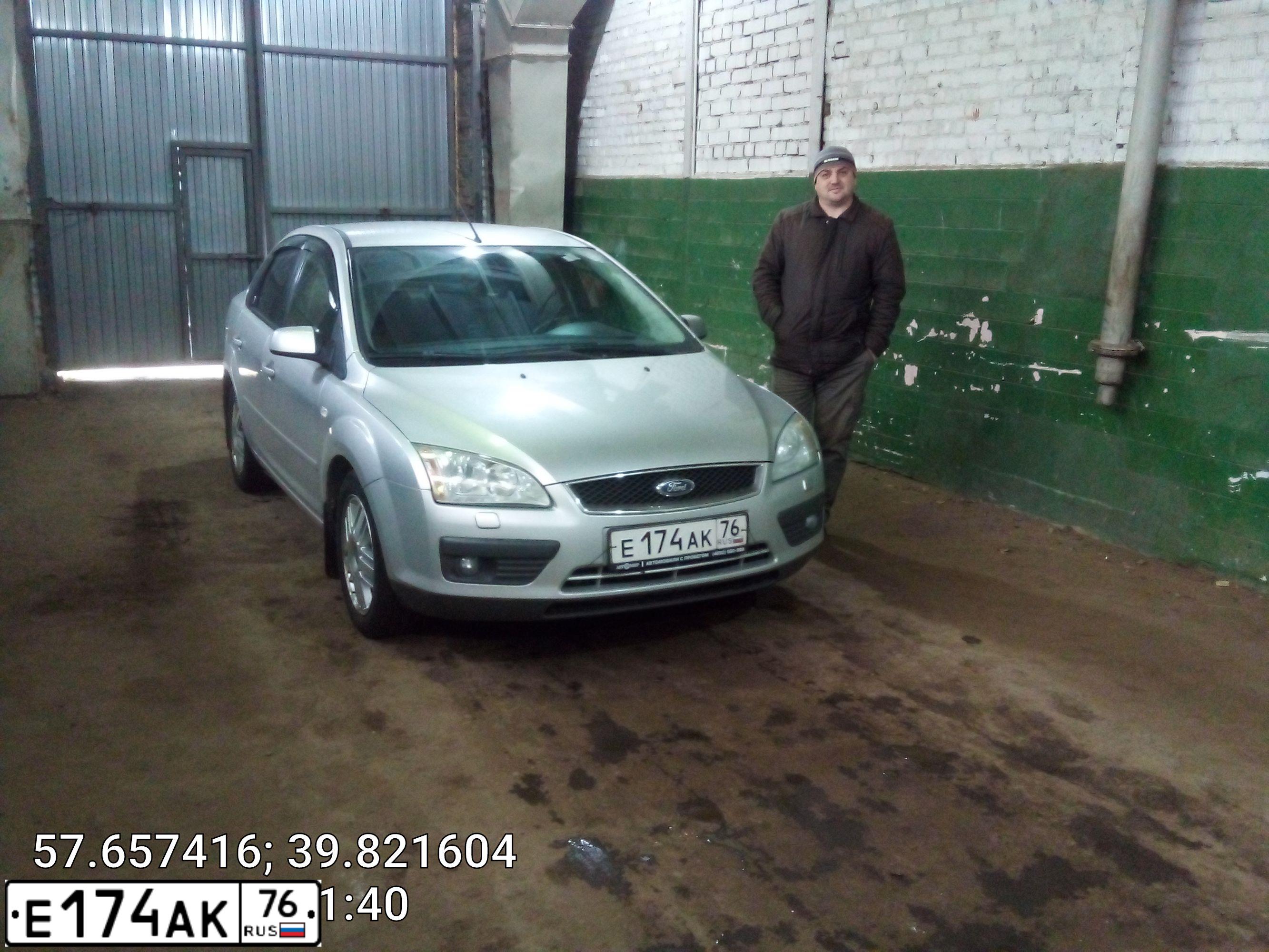 Фото автомобиля FORD FOCUS, 2006 — госномер О058АС76. Цвет: СЕРЫЙ