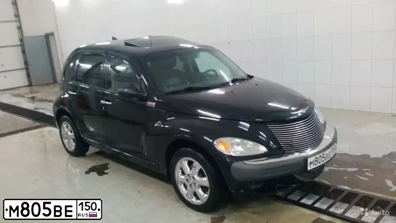 Фото автомобиля CHRYSLER PT CRUISER, 2001 — госномер В067ТС69. Цвет: ЧЕРНЫЙ