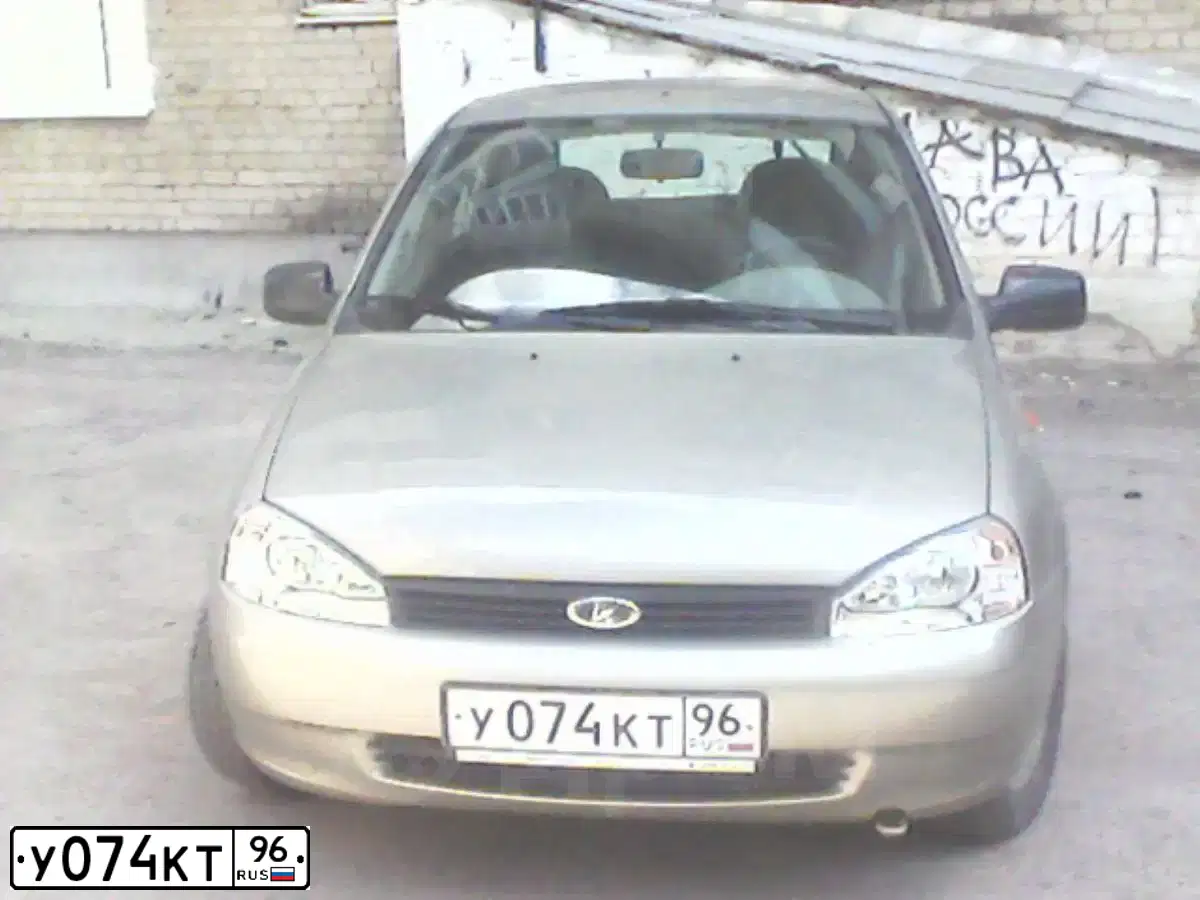 Фото автомобиля LADA 1119 KALINA, 2012 — госномер У074КТ96. Цвет: СЕРО-БЕЖЕВЫЙ