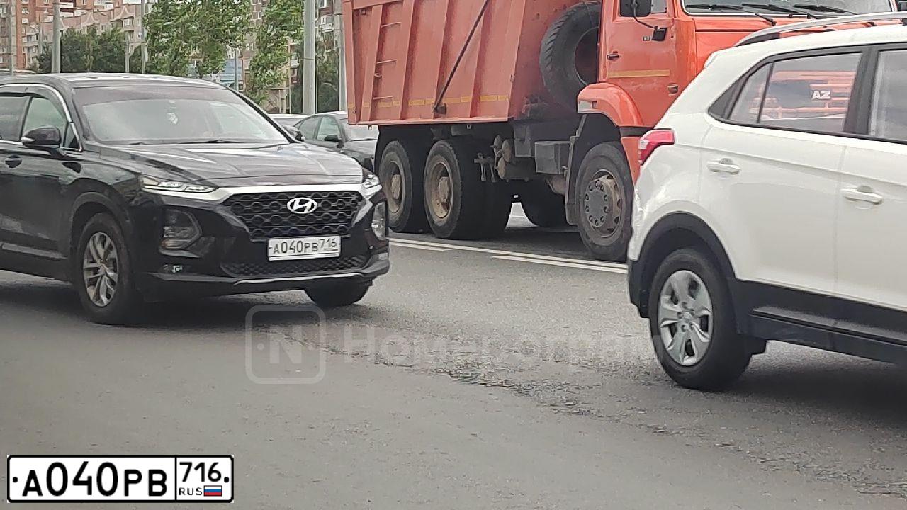 Фото автомобиля KIA SPORTAGE, 2013 — госномер О601НР716. Цвет: ЧЕРНЫЙ ПЕРЛАМУТР