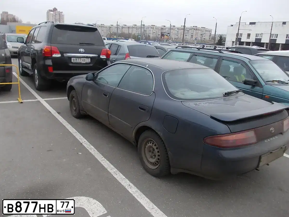 Фото автомобиля LADA 2107, 1995 — госномер В877НВ77. Цвет: Красный