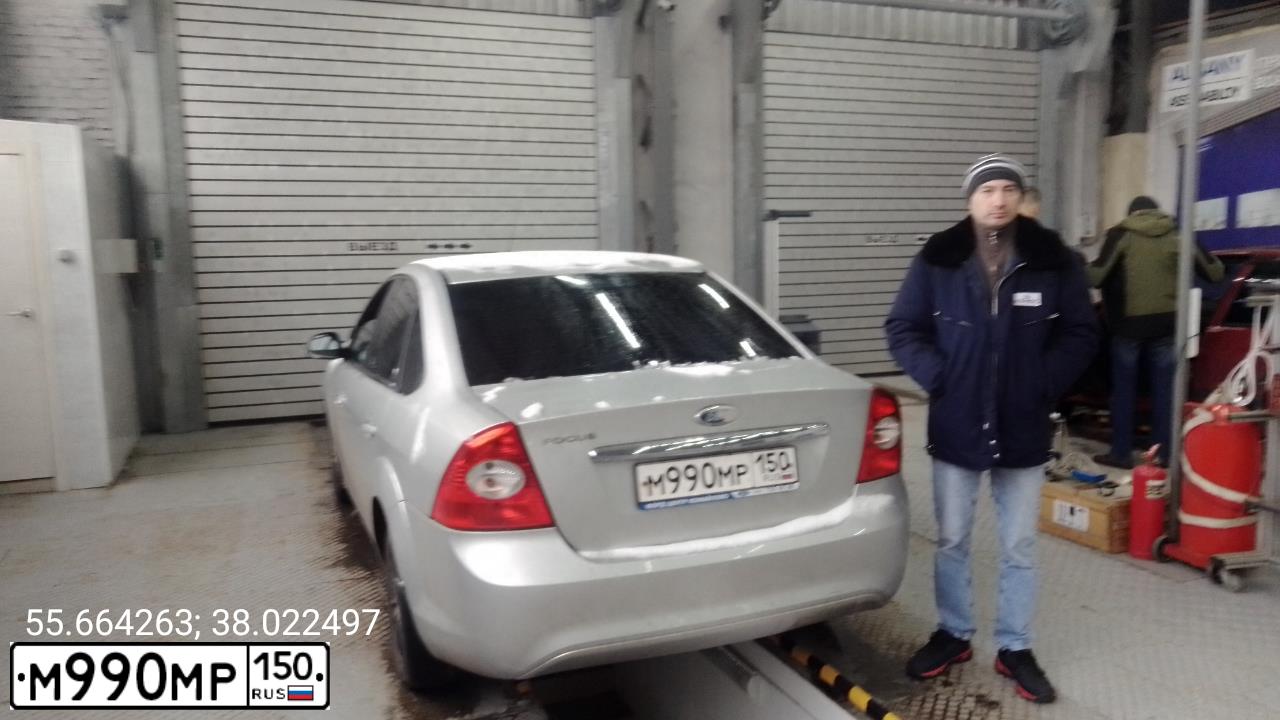 Фото автомобиля FORD FOCUS, 2008 — госномер М990МР150. Цвет: СЕРЫЙ СВЕТЛЫЙ