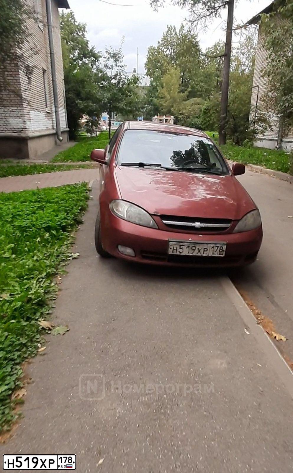 Фото автомобиля CHEVROLET LACETTI, 2012 — госномер Н519ХР178. Цвет: КРАСНЫЙ