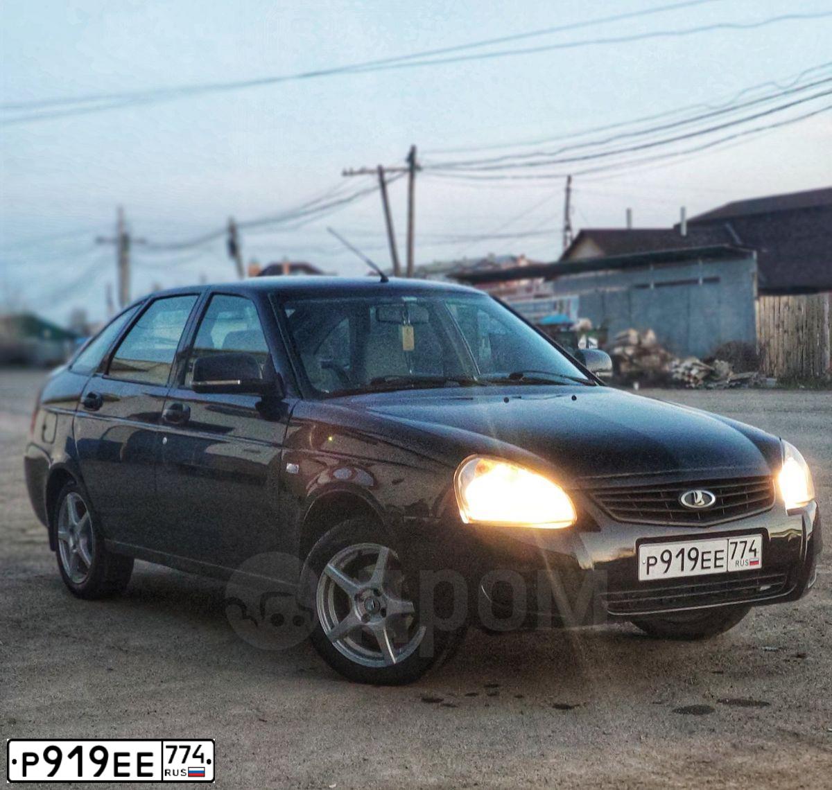 Фото автомобиля LADA 2172 PRIORA, 2012 — госномер К311ХА702. Цвет: Сине-Черный