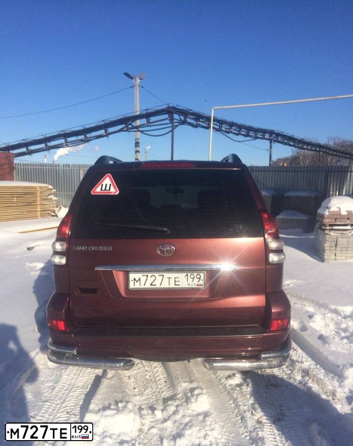 Фото автомобиля TOYOTA LANDCRUISER, 2008 — госномер У256АР55. Цвет: КРАСНЫЙ ТЕМНЫЙ