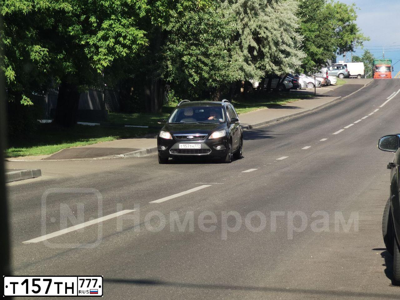 Фото автомобиля FORD FOCUS, 2010 — госномер Т157ТН777. Цвет: ЧЕРНЫЙ