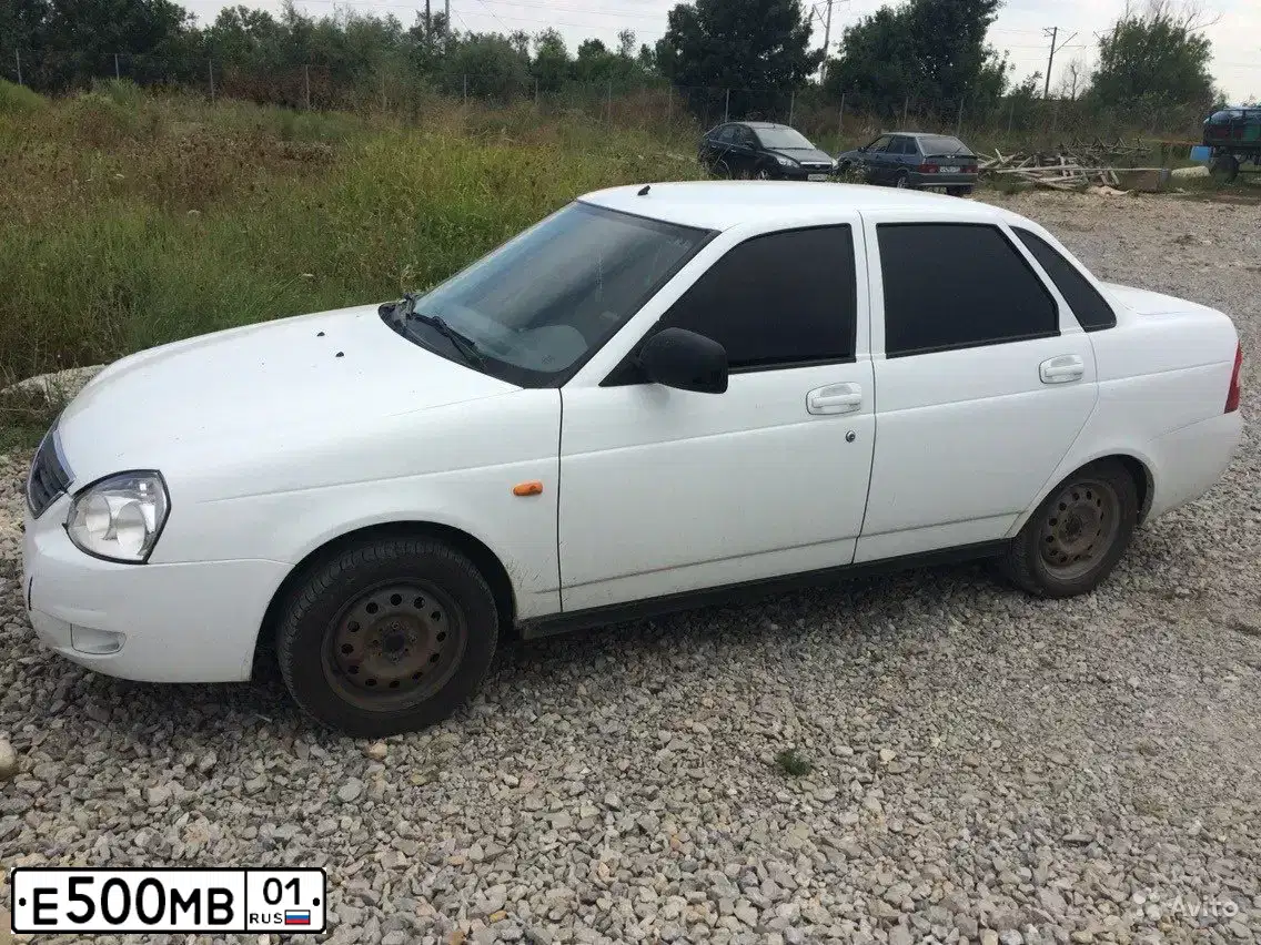 Фото автомобиля NISSAN MICRA, 2006 — госномер Е500МВ01. Цвет: СВЕТЛО-КОРИЧНЕВЫЙ
