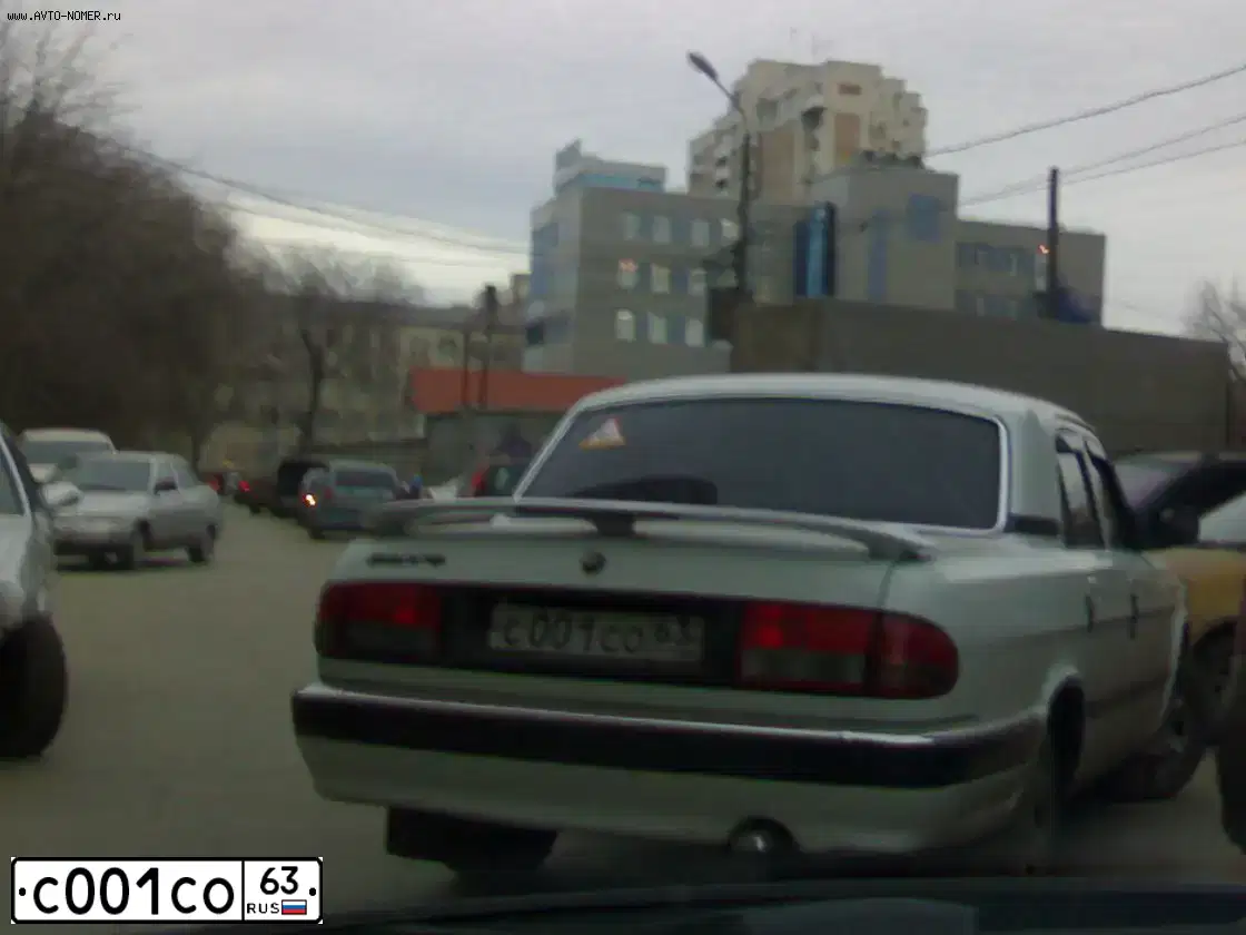 Фото автомобиля GAZ 3110 WOLGA, 2004 — госномер С001СО63. Цвет: Белый