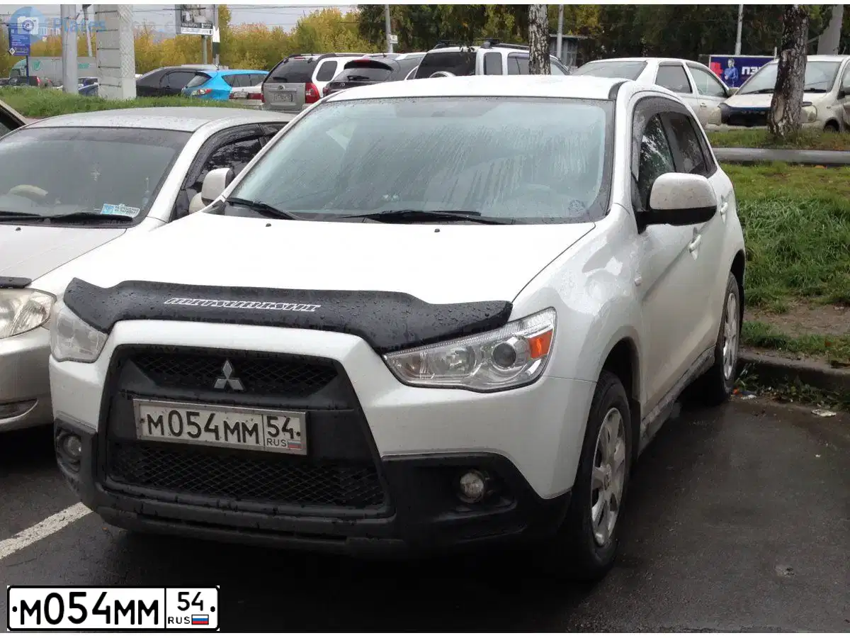 Фото автомобиля MITSUBISHI ASX, 2012 — госномер М054ММ54. Цвет: Белый