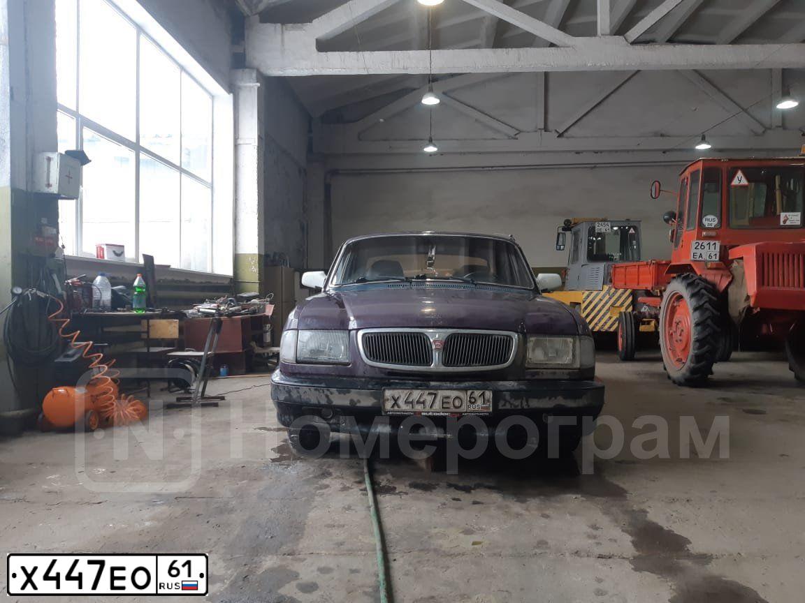 Фото автомобиля GAZ 3110 WOLGA, 1999 — госномер Х447ЕО61. Цвет: БАКЛАЖАННЫЙ