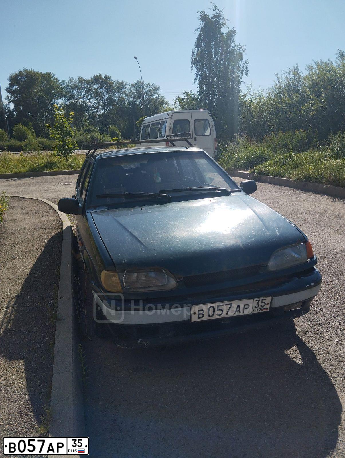 Фото автомобиля LADA 2115 SAMARA, 2002 — госномер В057АР35. Цвет: ТЕМНО-ЗЕЛЕНЫЙ