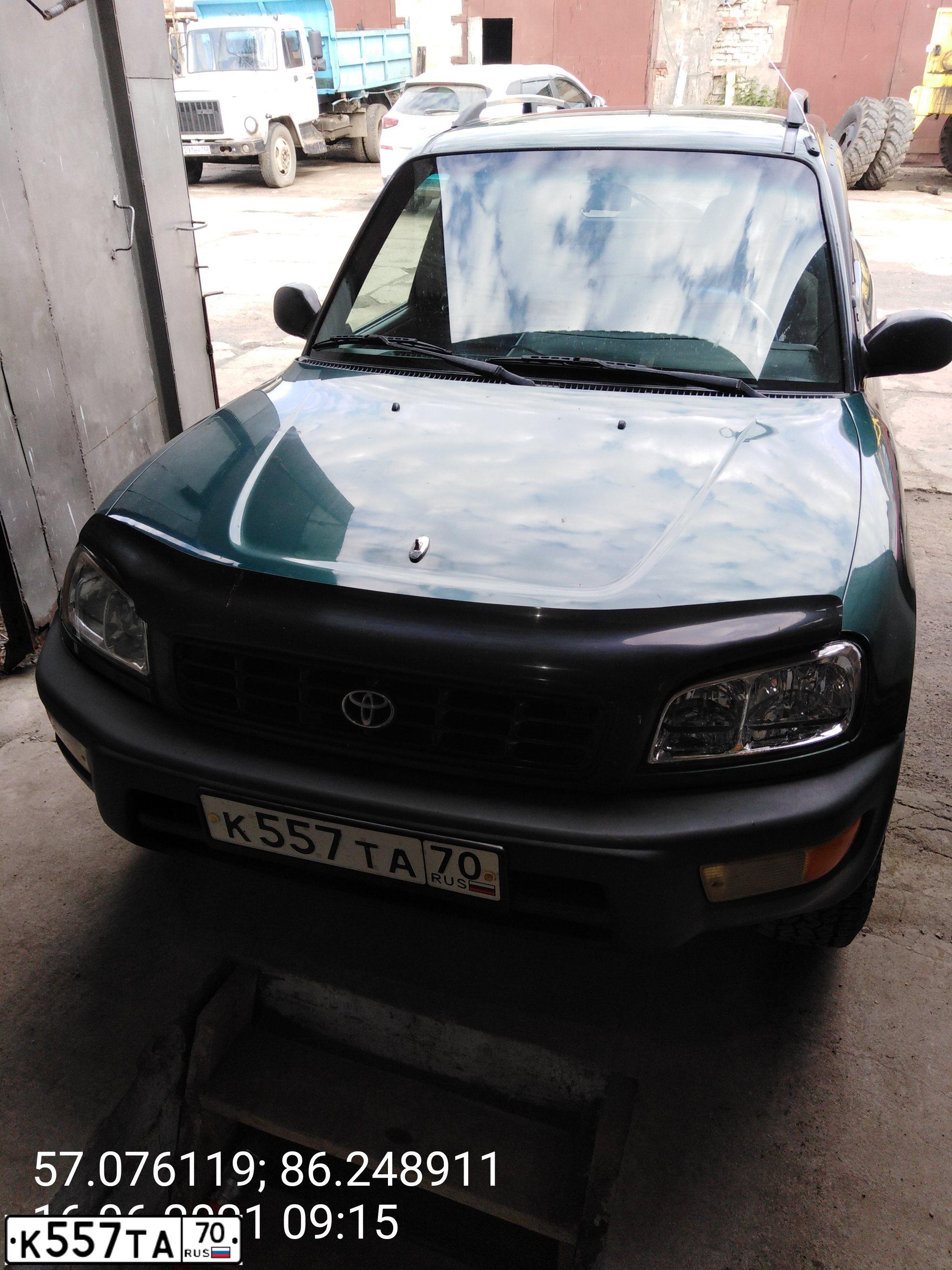 Фото автомобиля TOYOTA RAV4, 1999 — госномер К557ТА70. Цвет: МНОГОЦВЕТНЫЙ
