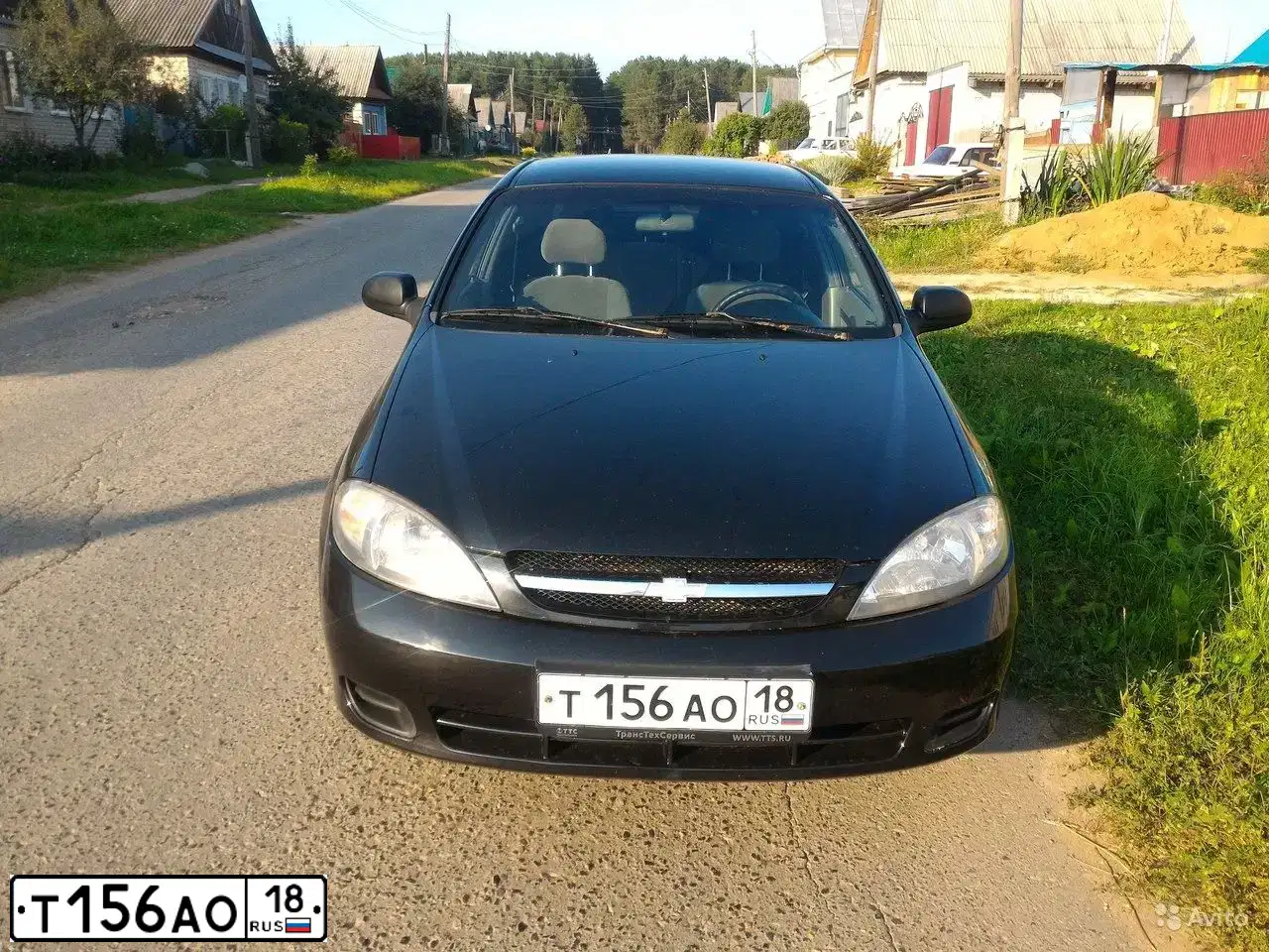 Фото автомобиля CHEVROLET LACETTI, 2007 — госномер Т156АО18. Цвет: ЧЕРНЫЙ