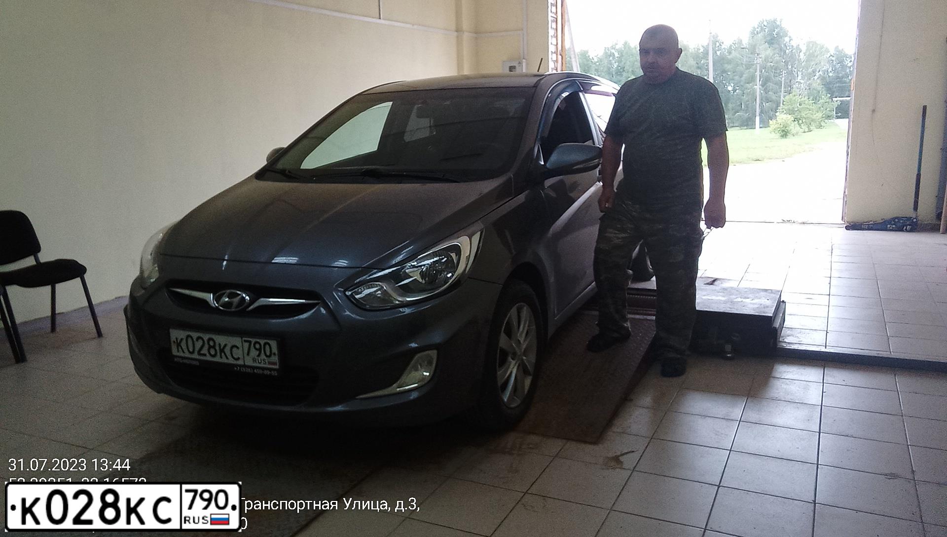 Фото автомобиля HYUNDAI SOLARIS, 2011 — госномер О314НН32. Цвет: ЧЕРНО-СЕРЫЙ