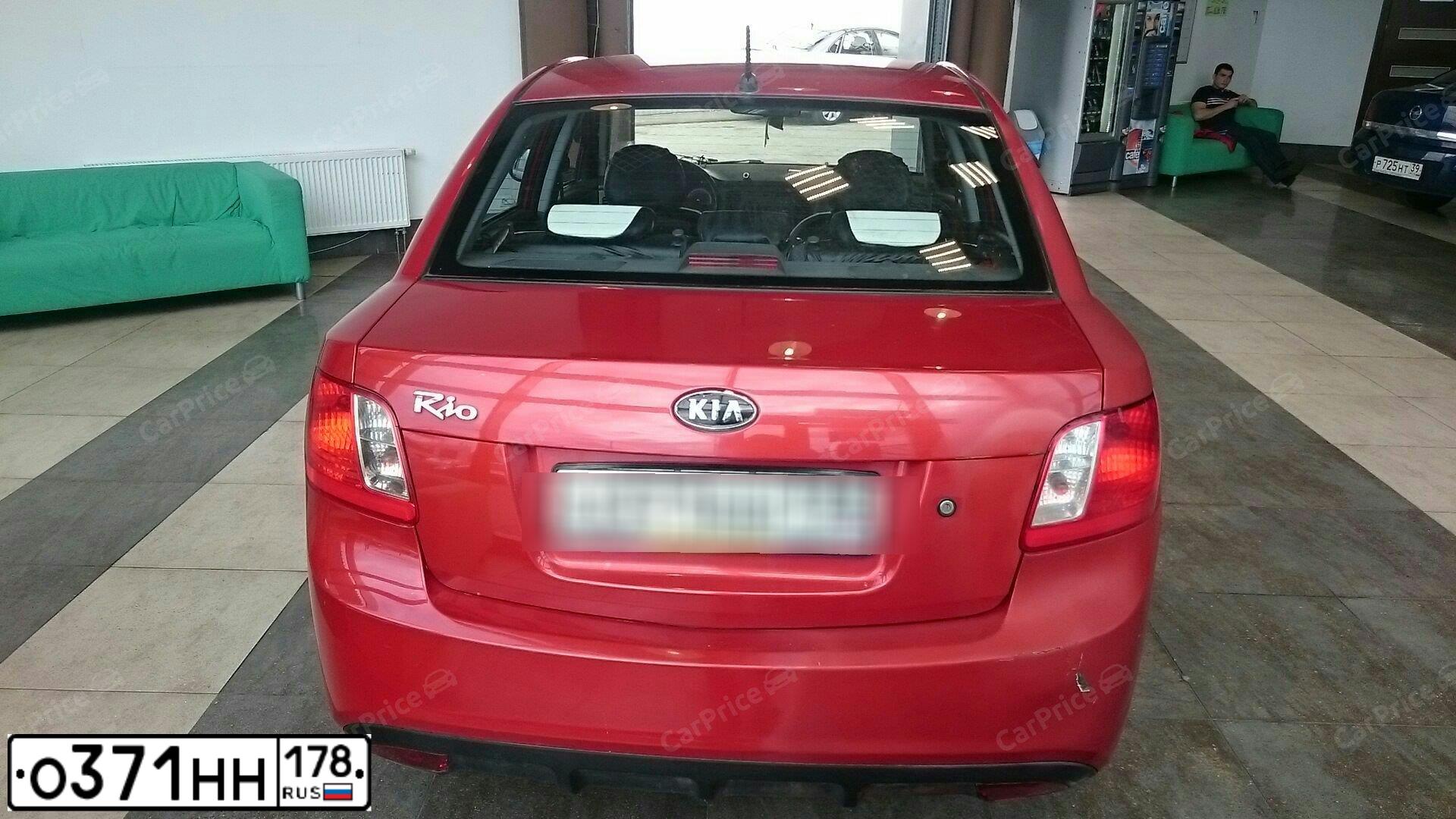 Фото автомобиля KIA RIO, 2010 — госномер Р086ВС180. Цвет: Красный