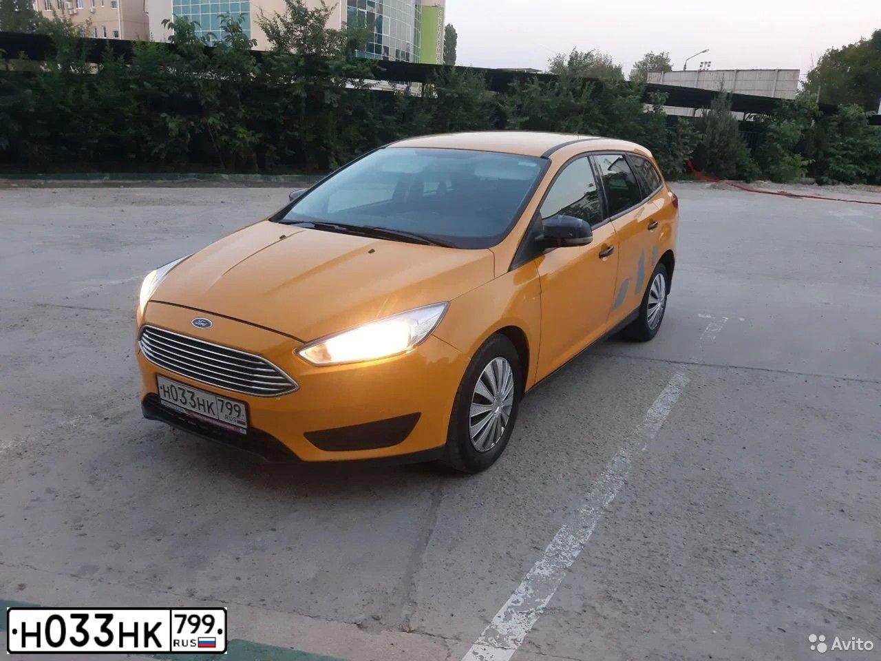 Фото автомобиля FORD D FOCUS, 2016 — госномер Н033НК799. Цвет: ЖЁЛТЫЙ