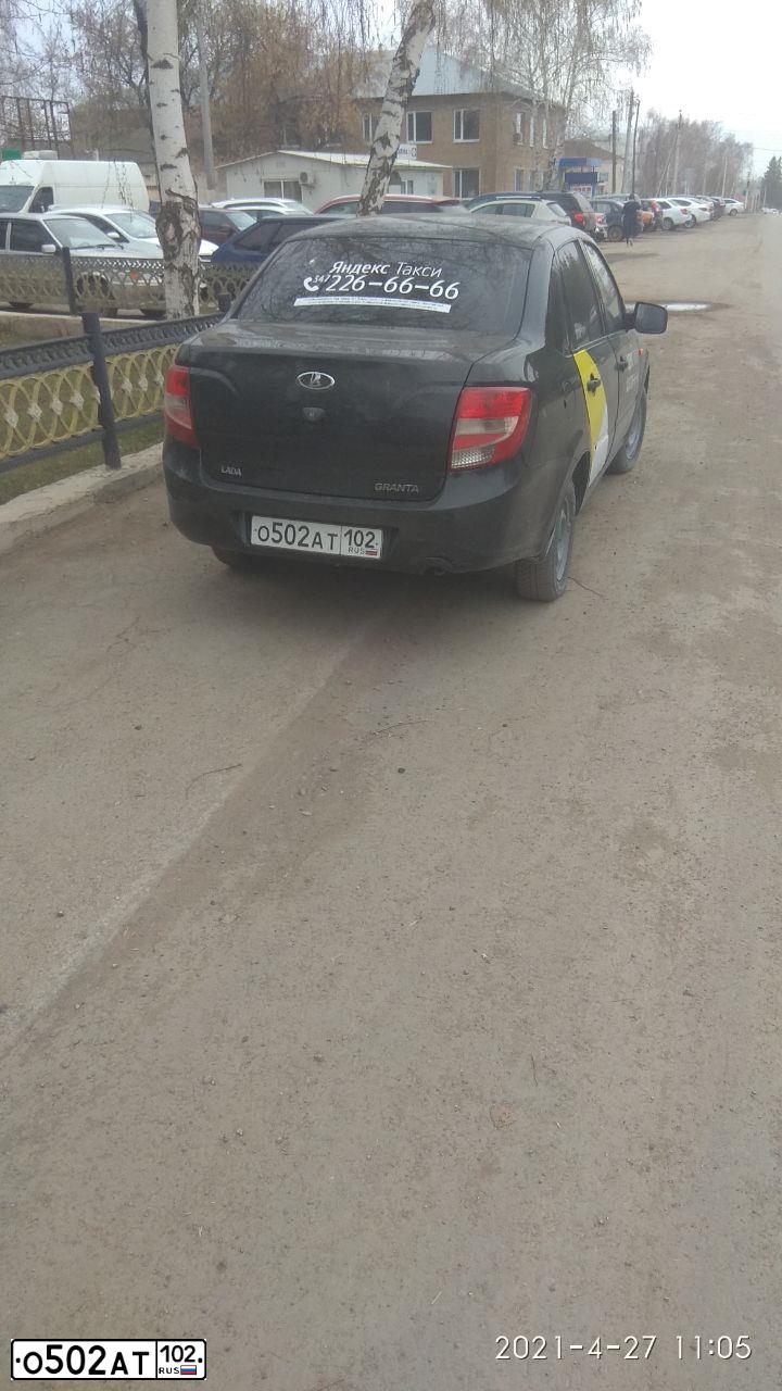 Фото автомобиля LADA 2190 GRANTA, 2012 — госномер О502АТ102. Цвет: СЕРО-ЧЕРНЫЙ