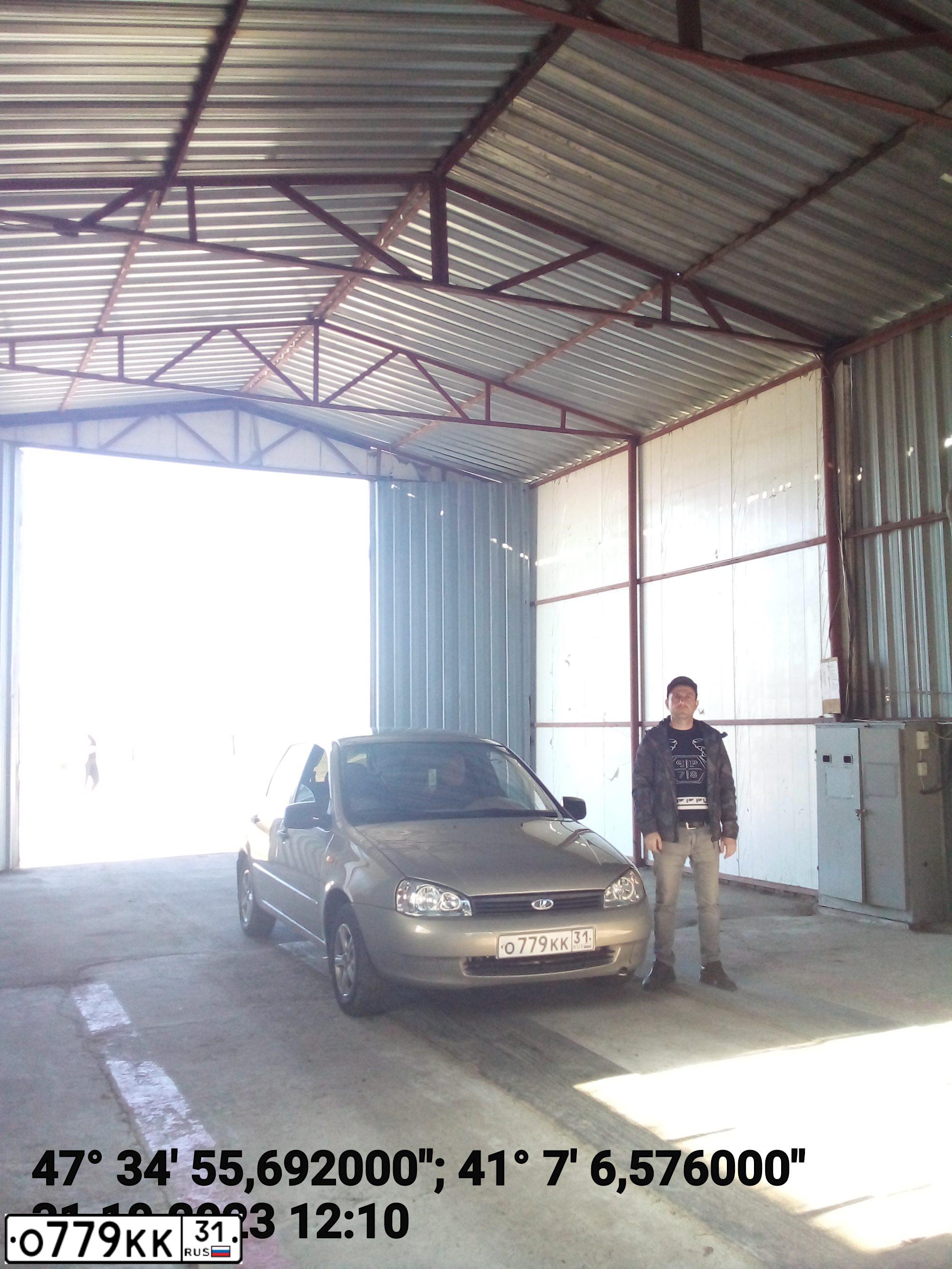 Фото автомобиля LADA 1119 KALINA, 2007 — госномер Х044АК31. Цвет: БЕЖЕВО-СЕРЫЙ
