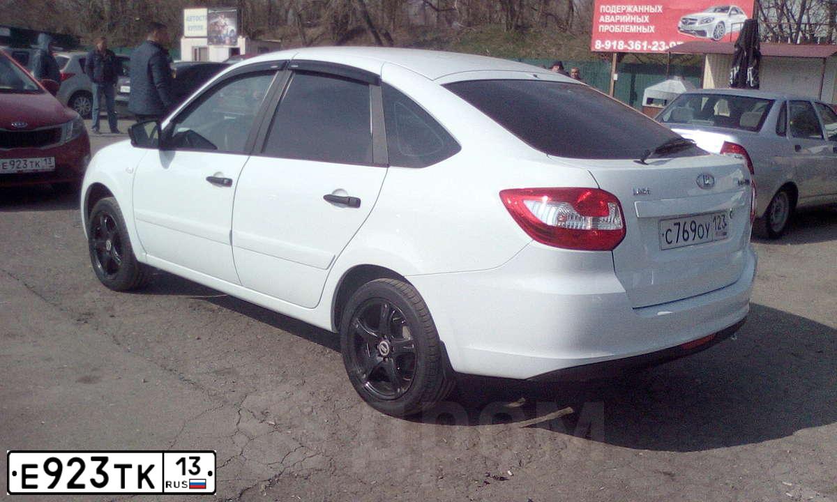 Фото автомобиля KIA RIO, 2012 — госномер О990СС123. Цвет: КРАСНЫЙ