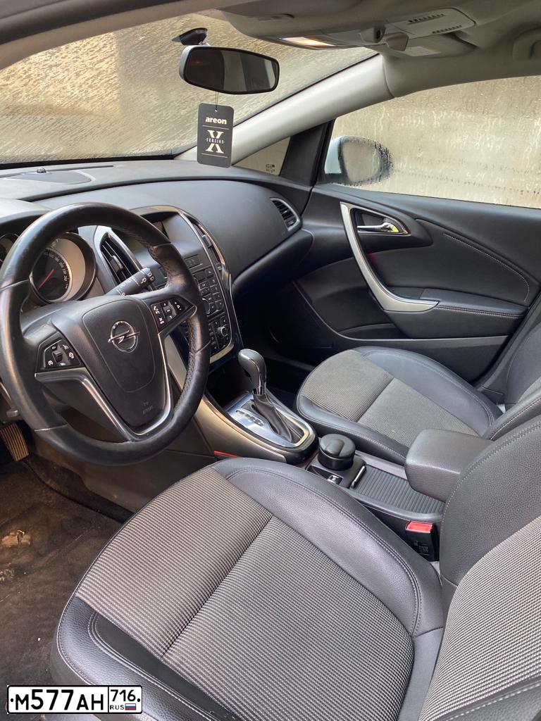 Фото автомобиля OPEL ASTRA, 2013 — госномер М577АН716. Цвет: Белый