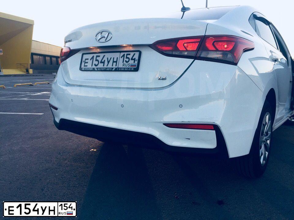 Фото автомобиля HYUNDAI SOLARIS, 2017 — госномер К256ТВ154. Цвет: Белый