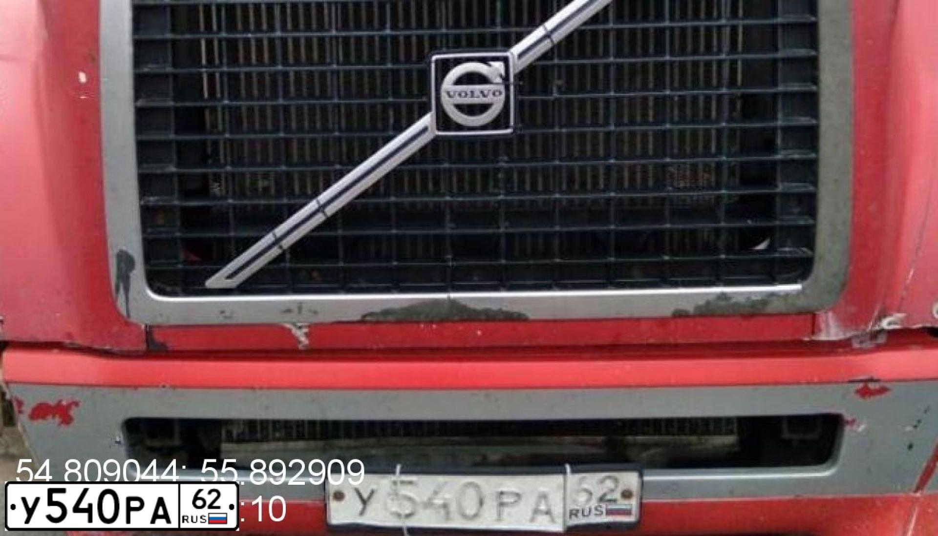 Фото автомобиля VOLVO SERIE VNL /6X4/, 2002 — госномер Н874ЕН48. Цвет: КРАСНЫЙ