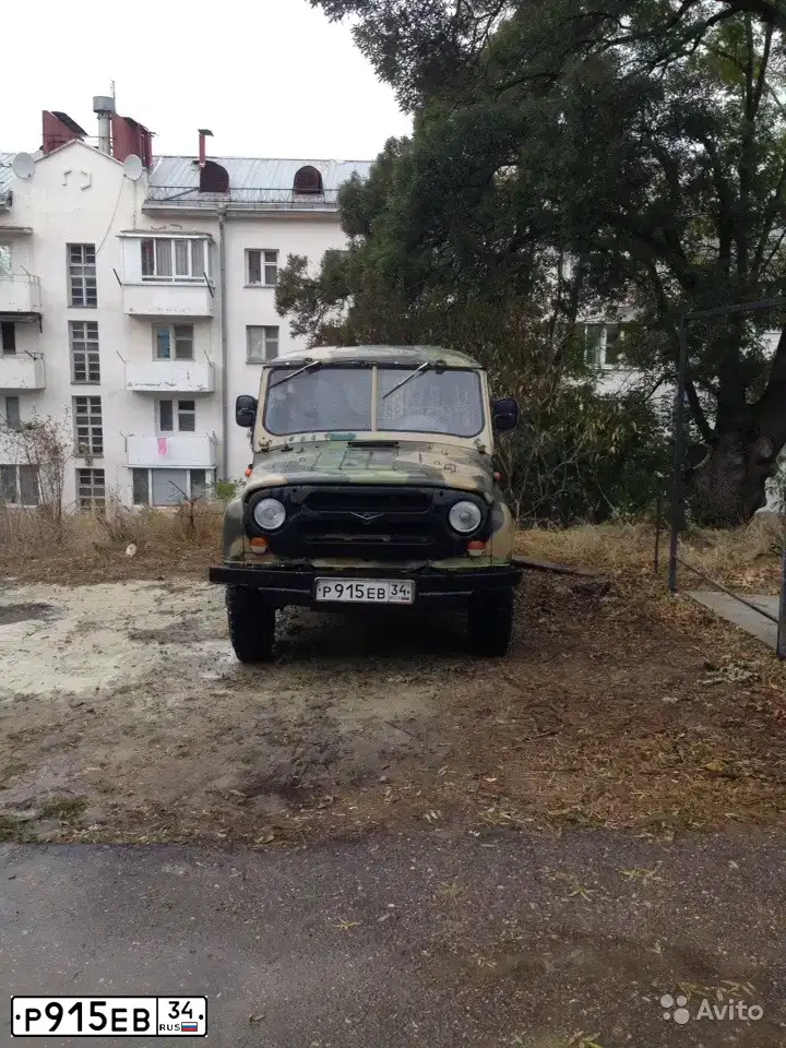 Фото автомобиля UAZ 3151 / HUNTER, 1993 — госномер Р915ЕВ34. Цвет: ЖЁЛТЫЙ