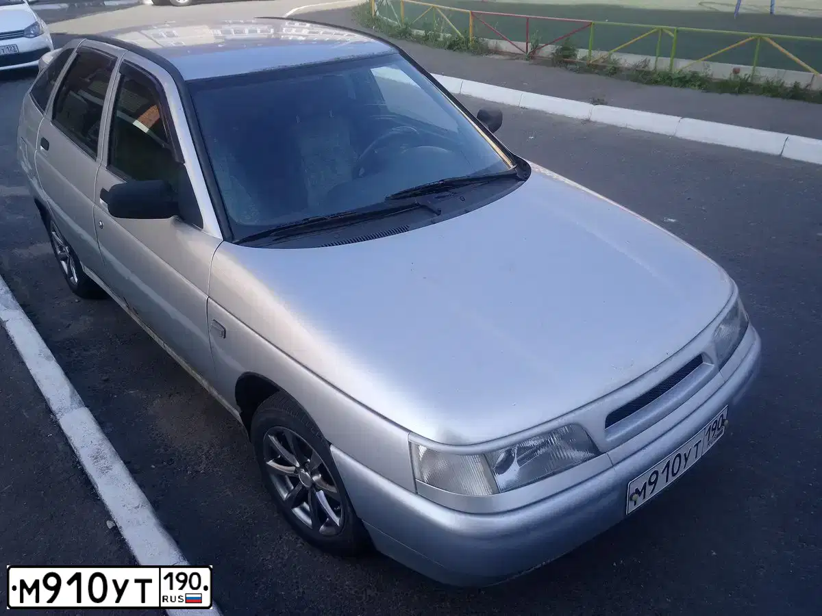 Фото автомобиля LADA 2112, 2007 — госномер М910УТ190. Цвет: СЕРЫЙ