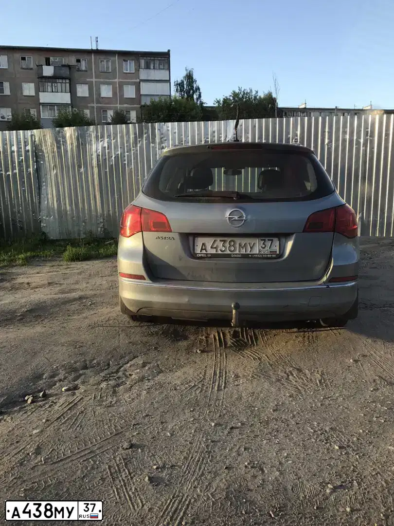Фото автомобиля OPEL ASTRA, 2013 — госномер А438МУ37. Цвет: СЕРЫЙ