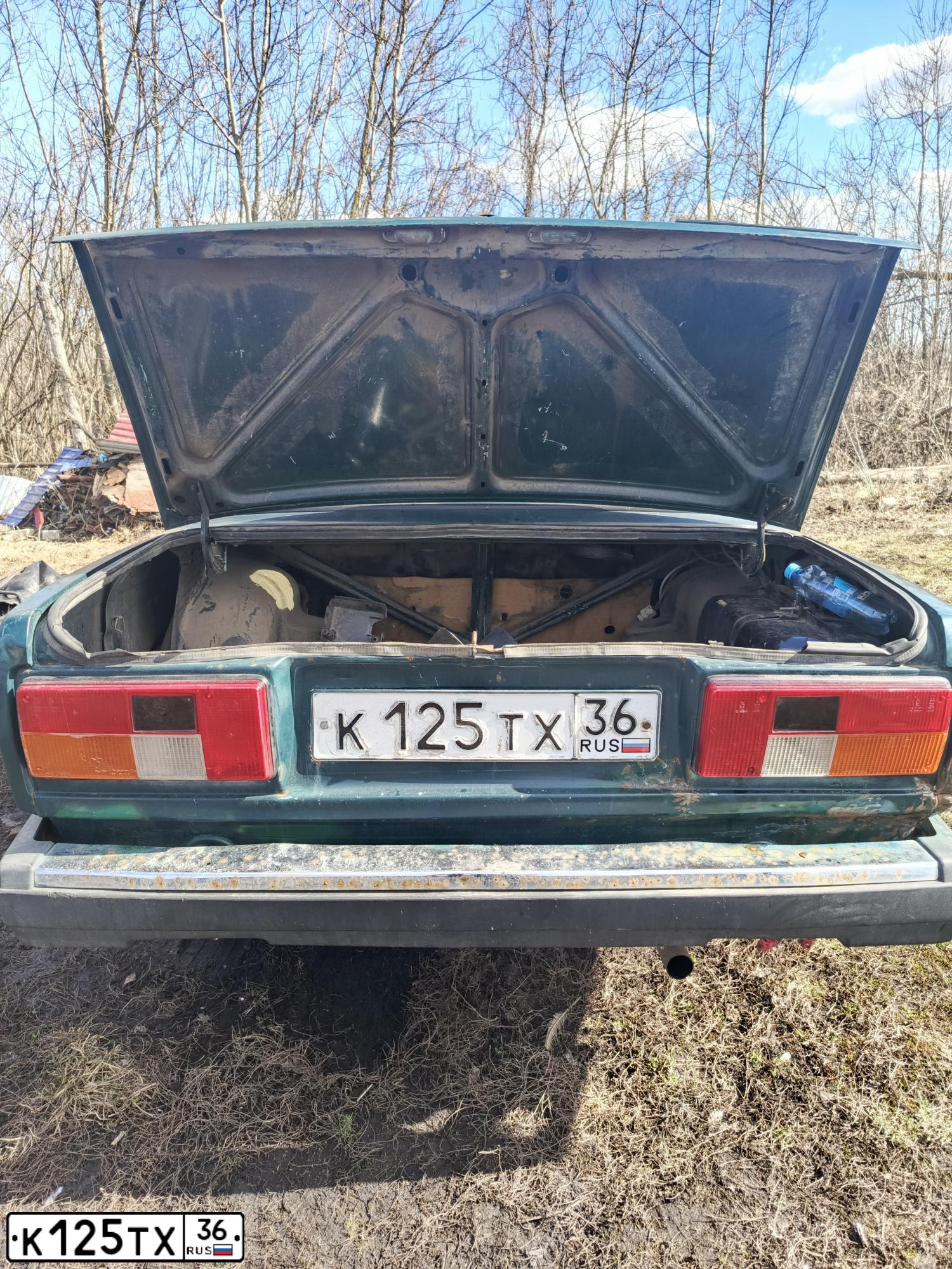 Фото автомобиля LADA 2107 LADA, 2006 — госномер К125ТХ36. Цвет: Темно-зеленый