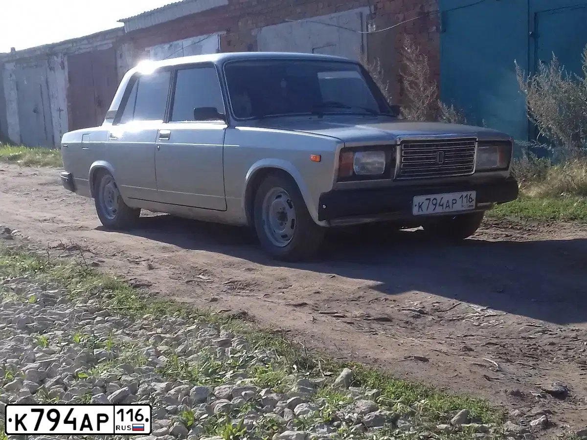 Фото автомобиля LADA 2107, 2001 — госномер К794АР116. Цвет: ТЕМНО-БОРДОВЫЙ