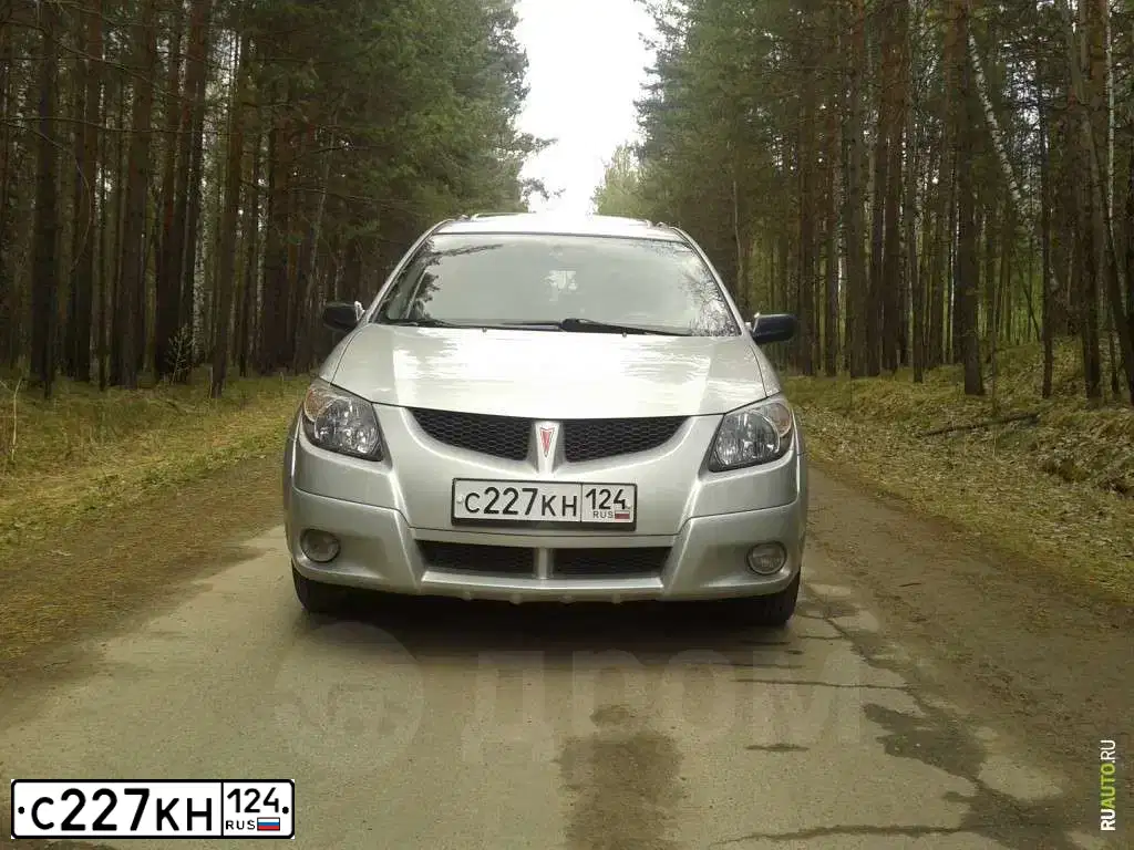 Фото автомобиля PONTIAC C VIBE, 2004 — госномер Е942ММ19. Цвет: СЕРЫЙ