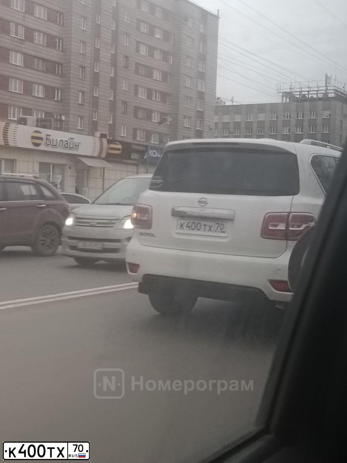 Фото автомобиля НИССАН ПАТРОЛ, 2015 — госномер К833ТТ70. Цвет: БЕЛЫЙ