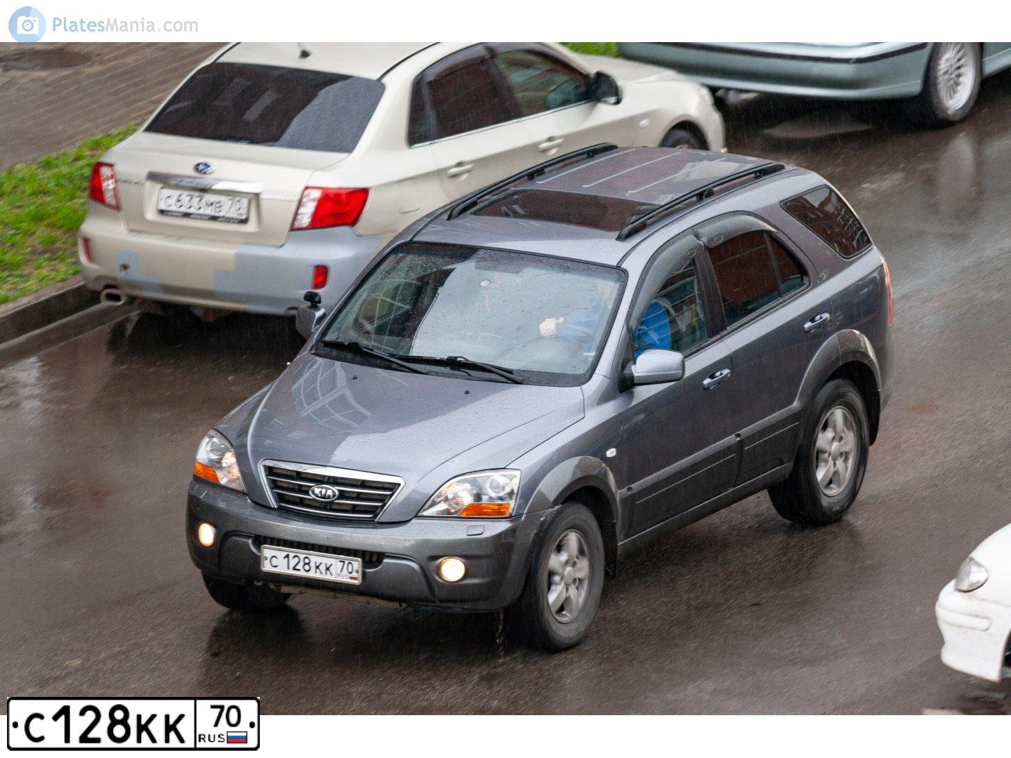 Фото автомобиля KIA SORENTO, 2007 — госномер С128КК70. Цвет: ТЕМНО-СЕРЫЙ