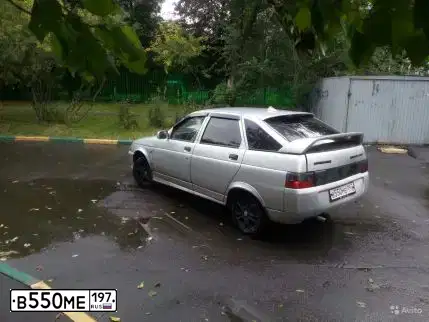 Фото автомобиля LADA 2112, 2004 — госномер Х503РЕ750. Цвет: СВЕТЛО-СЕРЕБРИСТЫЙ  МЕТАЛЛИК