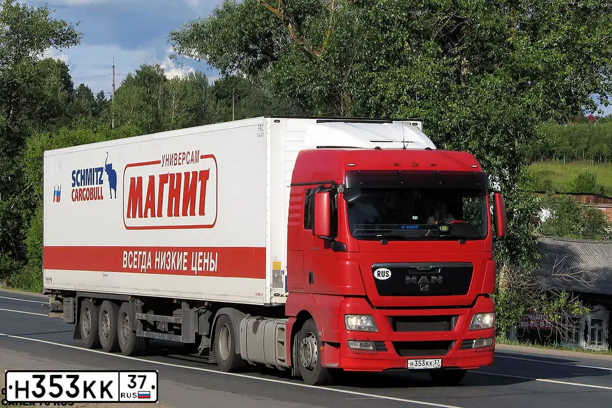 Фото автомобиля MAN TGX 18.XXX /4X2/, 2011 — госномер Н353КК37. Цвет: КРАСНЫЙ