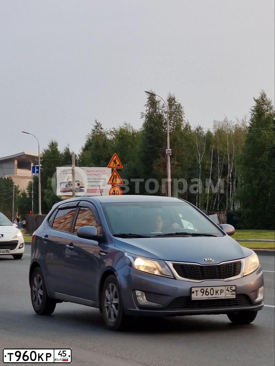 Фото автомобиля KIA RIO, 2013 — госномер Т960КР45. Цвет: ГОЛУБОЙ