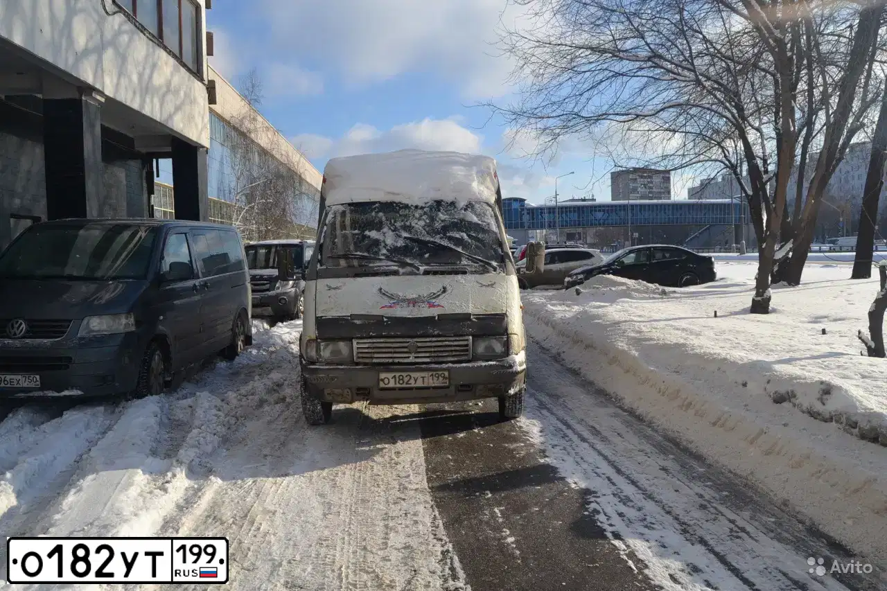 Фото автомобиля GAZ 3302 EL, 2000 — госномер О182УТ199. Цвет: СЕРО-БЕЛЫЙ