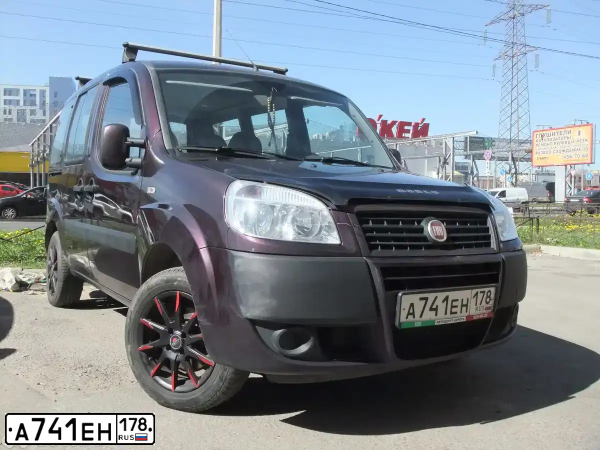 Фото автомобиля FIAT DOBLO, 2010 — госномер А741ЕН178. Цвет: ФИОЛЕТОВЫЙ