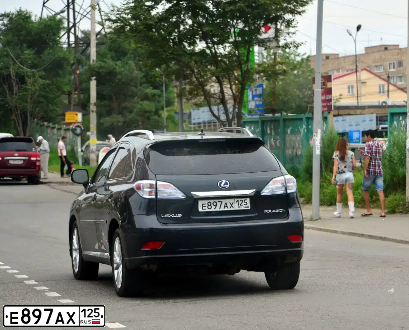 Фото автомобиля LEXUS RX450H, 2009 — госномер О937ХЕ125. Цвет: СЕРЫЙ