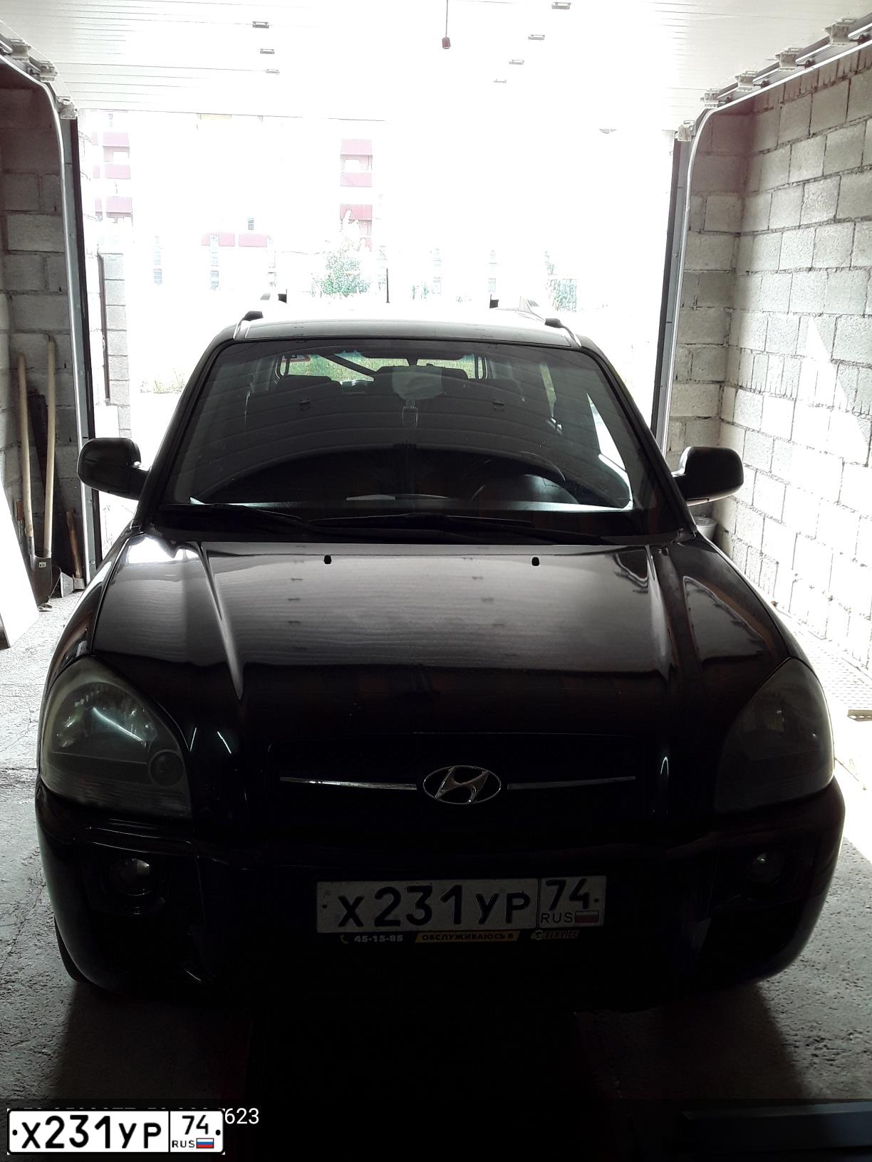 Фото автомобиля HYUNDAI TUCSON, 2005 — госномер Х231УР74. Цвет: Темно-зеленый