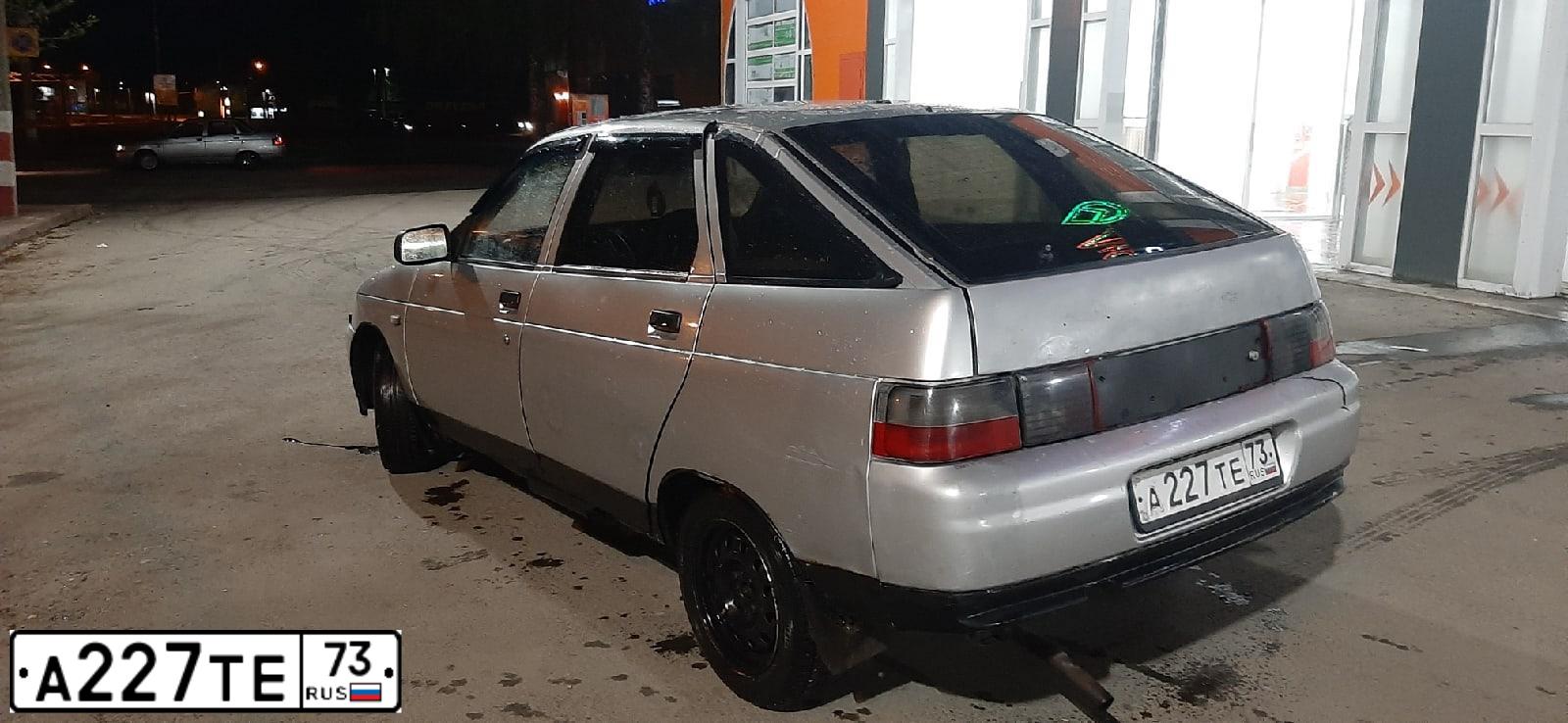 Фото автомобиля LADA 2112, 2002 — госномер А227ТЕ73. Цвет: СЕРЫЙ СВЕТЛЫЙ