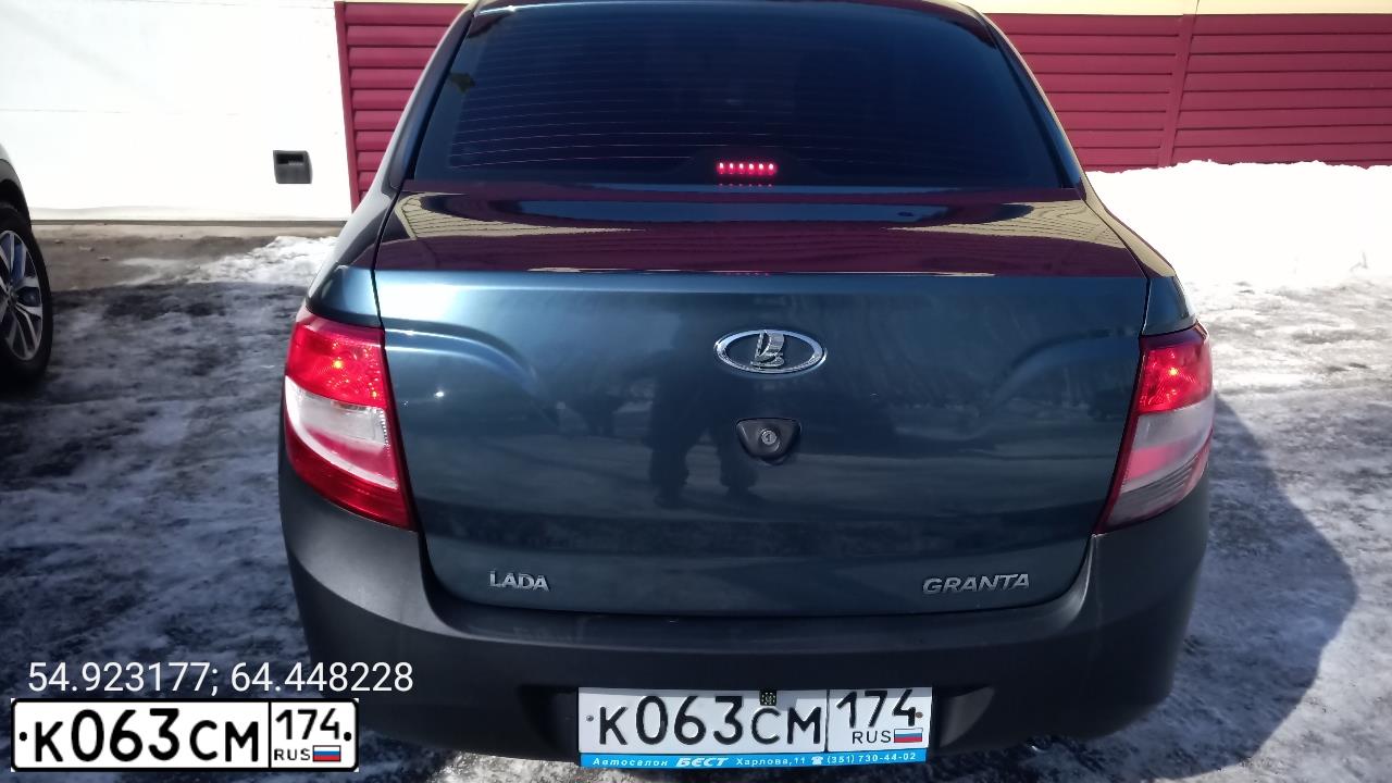 Фото автомобиля LADA 2190 GRANTA, 2013 — госномер К063СМ174. Цвет: Серо-Синий