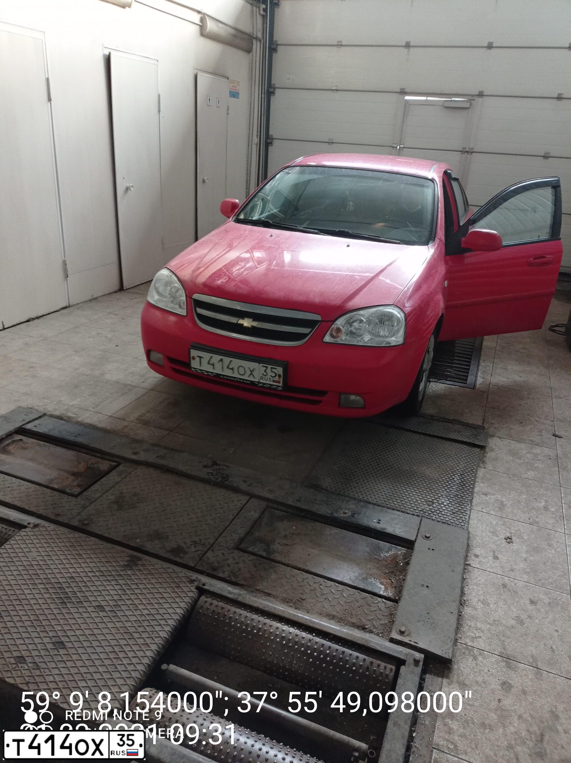 Фото автомобиля CHEVROLET LACETTI, 2007 — госномер Т414ОХ35. Цвет: Красный