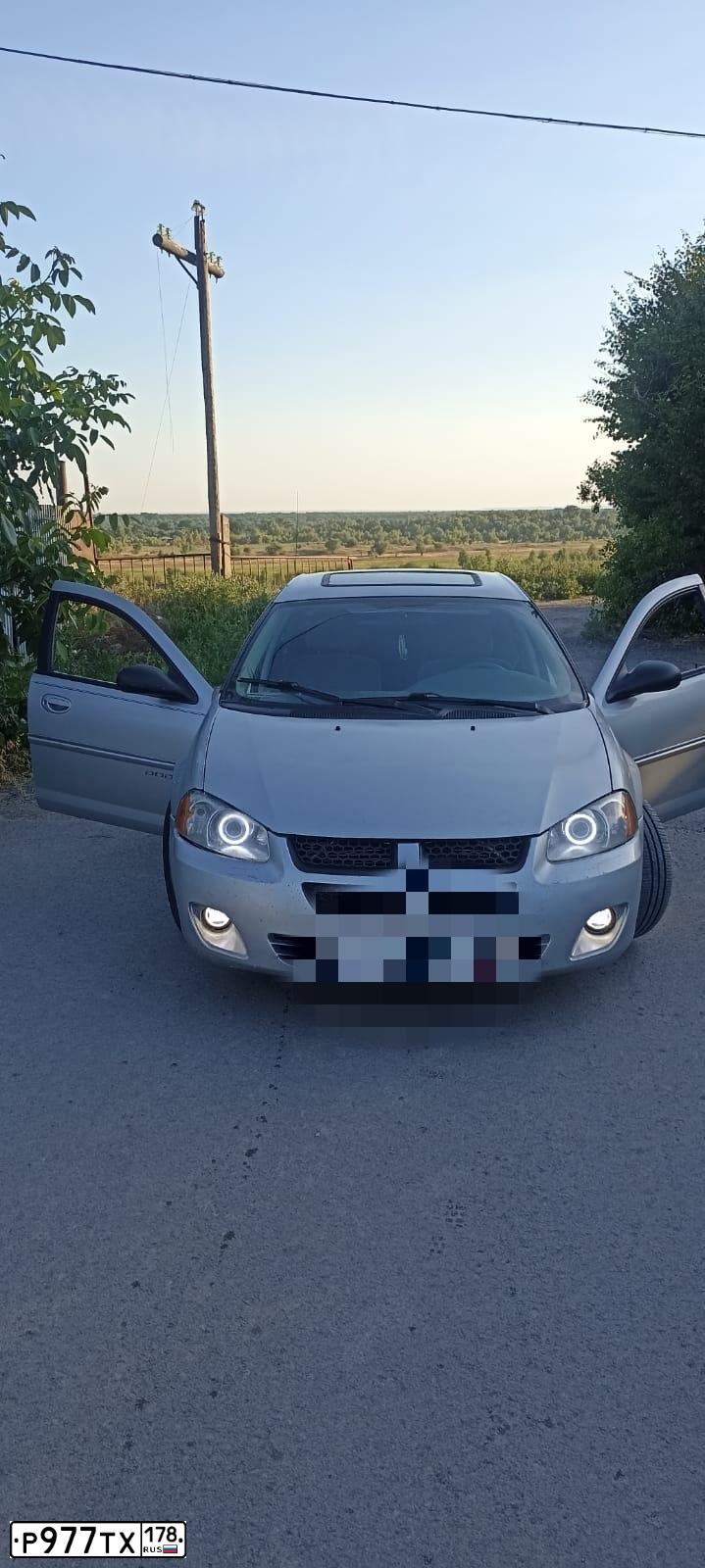 Фото автомобиля DODGE STRATUS, 2004 — госномер О136АЕ134. Цвет: Серебристый