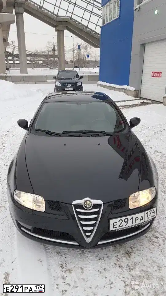 Фото автомобиля ALFAROMEO ALFA GT COUPE, 2007 — госномер Е291РА174. Цвет: ЧЕРНЫЙ